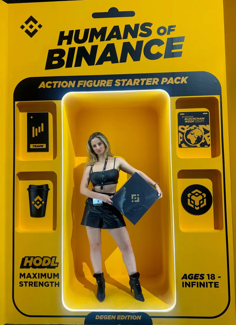 Jana inside the Binance Humans of Binance Action Figure box β DEGEN EDITION at Blockchain Week Dubai